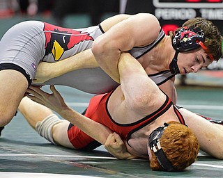 COLUMBUS, OHIO - MARCH 5, 2016: David Crawford of Canfield controls the body of Kade Byland of Salem as the two wrestle on the mat during their 160lb Division II consolation bracket bout Saturday morning at Schottenstein Center. DAVID DERMER | THE VINDICATOR