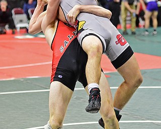 COLUMBUS, OHIO - MARCH 5, 2016: David Crawford of Canfield is picked up from behind by Kade Byland of Salem during their 160lb Division II consolation bracket bout Saturday morning at Schottenstein Center. DAVID DERMER | THE VINDICATOR