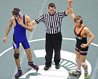 COLUMBUS, OHIO - MARCH 5, 2016: Sid Ohl of Ashland has his arm raised in victory by the referee after defeating Dave Esarco of Poland in the Division II seventh place bout Saturday morning at Schottenstein Center. DAVID DERMER | THE VINDICATOR