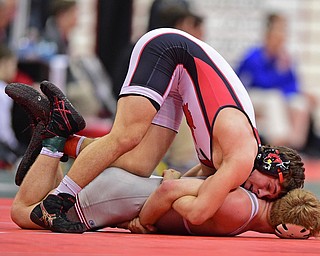 COLUMBUS, OHIO - MARCH 5, 2016: David Crawford of Canfield controls the back of Kyle Myers of Canal Fulton Northwest during their 160lb Division II third place bout Saturday morning at Schottenstein Center. DAVID DERMER | THE VINDICATOR