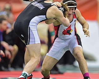 COLUMBUS, OHIO - MARCH 5, 2016: Dominic Cooper of Canfield jerks the neck of Gage Braun of St. Paris Graham Local during their 182lb Division II fifth place bout Saturday morning at Schottenstein Center. DAVID DERMER | THE VINDICATOR