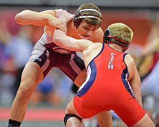 COLUMBUS, OHIO - MARCH 5, 2016: Mario Graziani of Boardman stuffs a takedown attempt from Adam Green of Fitch during their 160lb Division I seventh place bout Saturday morning at Schottenstein Center. DAVID DERMER | THE VINDICATOR