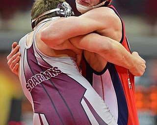 COLUMBUS, OHIO - MARCH 5, 2016: Adam Green of Fitch attempts to throw Mario Graziani of Boardman to the mat during their 160lb Division I seventh place bout Saturday morning at Schottenstein Center. DAVID DERMER | THE VINDICATOR