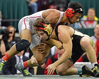 COLUMBUS, OHIO - MARCH 5, 2016: Georgio Poullas of Canfield grabs for the leg to make a move on  Richard Jackson of Toledo Central Catholic during their 152lb Division 2 Championship bout Saturday night night at Schottenstein Center. DAVID DERMER | THE VINDICATOR