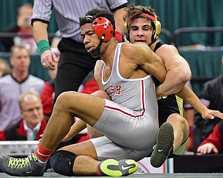 COLUMBUS, OHIO - MARCH 5, 2016: Georgio Poullas of Canfield controls the back of Richard Jackson of Toledo Central Catholic while taking him to the ground during their 152lb Division 2 Championship bout Saturday night night at Schottenstein Center. DAVID DERMER | THE VINDICATOR