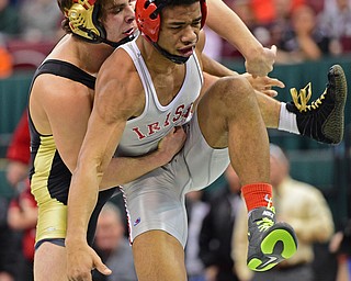 COLUMBUS, OHIO - MARCH 5, 2016: Georgio Poullas of Canfield fights to keep Richard Jackson of Toledo Central Catholic down onto the mat during their 152lb Division 2 Championship bout Saturday night night at Schottenstein Center. DAVID DERMER | THE VINDICATOR