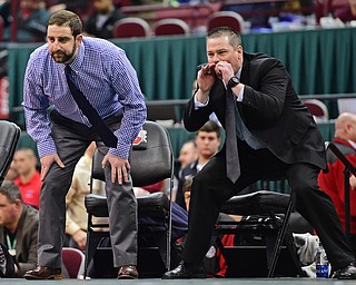 COLUMBUS, OHIO - MARCH 5, 2016: Coaches Dean Conley (right) shouts instructions from the bench while coach Steve Pitts watches Georgio Poullas of Canfield during the 152lb Division 2 Championship bout Saturday night night at Schottenstein Center. DAVID DERMER | THE VINDICATOR