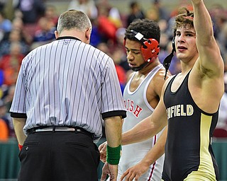 COLUMBUS, OHIO - MARCH 5, 2016: Georgio Poullas of Canfield points to his family in the stands after defeating Richard Jackson of Toledo Central Catholic in their 152lb Division 2 Championship bout Saturday night night at Schottenstein Center. DAVID DERMER | THE VINDICATOR