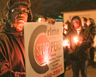 William d Lewis the vindicator Rick Alli of Crime Stoppers was among the more than 200 people who gathered 3-5-16 on Orchard Ave in Hubbard for vigil to remember Cody Pitts who was murdered near that site.