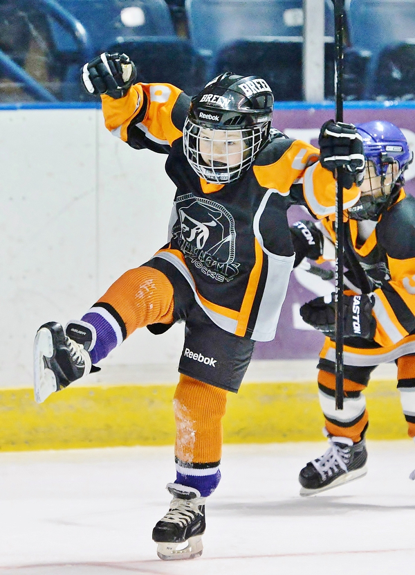 Jeff Lange | The Vindicator  SUN, MAR 6, 2016 - Youngstown Phantoms' Breen Dahman, age seven, celebrates after a goal in the second half of Youngstown's consolation game against the Dayton Stealth during the Phantoms ADM Fantastic Finale 4-8 year old Tournament held at the Covelli Centre and Ice Zone in Boardman on Sunday.