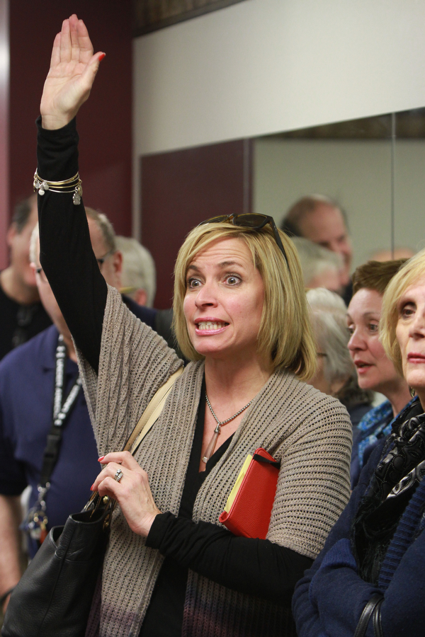 William d Lewis The vindicatorCandace LaRocca of Boardman raises her had during  a public meeting Monday 3-7-16 concerning recent Mill Creek PArk happenings. About 200 people attended the event.