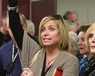 William d Lewis The vindicatorCandace LaRocca of Boardman raises her had during  a public meeting Monday 3-7-16 concerning recent Mill Creek PArk happenings. About 200 people attended the event.