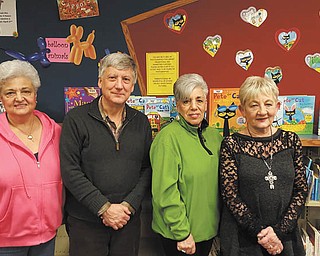 SPECIAL TO THE VINDICATOR | Friends of Leetonia Community Public Library elected officers for 2016 at its January meeting; they include treasurer Toni Manzetti, left, secretary Paul Rohrbaugh, vice president Suzanne Tobuck and president Jackie Keeler. The Friends will host a book sale from 9:30 a.m. to 12:30 p.m. March 12 in the community room at the library, 181 Walnut St., and all proceeds will benefit the library’s summer reading program. The next Friends meeting is 6 p.m. March 17 at the library and will be open to the public.