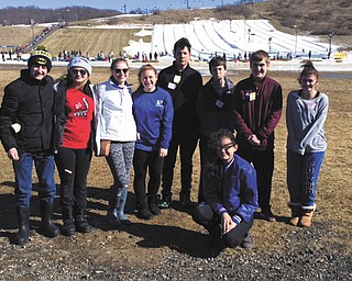 SPECIAL TO THE VINDICATOR | Members of the Holy Family Youth Ministry participated in a winter retreat on Feb. 20 in conjunction with the Youngstown Youth Collaborative, a collaboration of area Catholic youth ministries. The day began with a retreat followed by a lunch at Holy Family. The group then left for the Polar Blast at Brandywine for an afternoon of snow tubing, despite temperatures in the high 60s. They concluded witha  5 p.m. Mass at St. Barnabas Parish in Northfield. Coordinators for the event were the following youth ministers: Tracey Smrek, St. Luke; Alvera Bell and Virginia Bartos, Christ Our Shepherd; Jocelyn Welsh and Gerry Land, St. Joseph/ Our Land of the Lakes; and Natalie Wardle, St. Charles/ St. Brendan. Among those enjoying the day were from left, Mark Stein, Abbey Lea, Meredith Lea, Tori Moderalli, Izzac Lange, Stephen Babik, Brendan Kuzior, Maria LoCicero, and kneeling, Viktorya Lange.