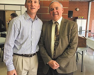 SPECIAL TO THE VINDICATOR | Youngstown Lions recently met at the YMCA and welcomed speaker Pat Lowry, communications director for U.S. Congressman Tim Ryan and a member of the nonprofit board of Jubilee Gardens. Lowry, left, is shown with Lions first vice president Kyle Miasek following his speech. Lowry shared information on Jubilee, located on Tod Lane in Youngstown in the city’s Brier Hill neighborhood, that consists of two acres with 40 fenced-in gardening plots. Volunteers dig up the plots for anyone to plant vegetables for their own use, and seeds or plants are provided for those who cannot afford them. Jubilee has 13 board members and an $800 budget. All Jubilee workers are volunteers who want participants to have the satisfaction of growing their own healthy food. 


