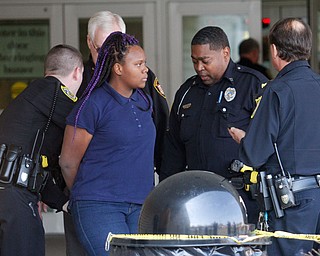      ROBERT K. YOSAY  | THE VINDICATOR..Students and police inside of East High School when a series of fights broke out Tuesday morning all agree that the scene was chaotic..More than two dozen officers responded to the school after a fight about 11:10 a.m. that was broken up, then escalated into a series of several other fights Ñ resulting in chemical spray being used to help control those brawling...--30-...