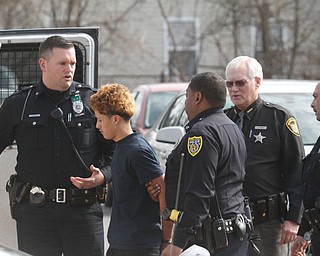      ROBERT K. YOSAY  | THE VINDICATOR..Students and police inside of East High School when a series of fights broke out Tuesday morning all agree that the scene was chaotic..More than two dozen officers responded to the school after a fight about 11:10 a.m. that was broken up, then escalated into a series of several other fights Ñ resulting in chemical spray being used to help control those brawling...--30-...