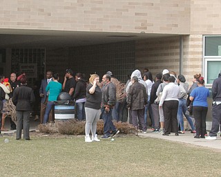      ROBERT K. YOSAY  | THE VINDICATOR..Students and police inside of East High School when a series of fights broke out Tuesday morning all agree that the scene was chaotic..More than two dozen officers responded to the school after a fight about 11:10 a.m. that was broken up, then escalated into a series of several other fights Ñ resulting in chemical spray being used to help control those brawling...--30-...