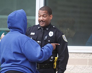      ROBERT K. YOSAY  | THE VINDICATOR..Students and police inside of East High School when a series of fights broke out Tuesday morning all agree that the scene was chaotic..More than two dozen officers responded to the school after a fight about 11:10 a.m. that was broken up, then escalated into a series of several other fights Ñ resulting in chemical spray being used to help control those brawling...--30-...
