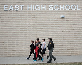      ROBERT K. YOSAY  | THE VINDICATOR..Students and police inside of East High School when a series of fights broke out Tuesday morning all agree that the scene was chaotic..More than two dozen officers responded to the school after a fight about 11:10 a.m. that was broken up, then escalated into a series of several other fights Ñ resulting in chemical spray being used to help control those brawling...--30-...