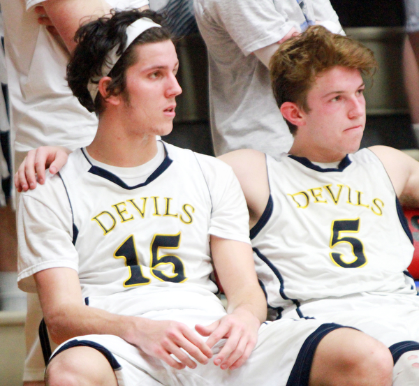 William D. Lewis The Vindicator  McDonald's Jake Reckard(15) and Zack Fedyski(5) watch the final secopnds of McDonald's loss to Lutheran East in Canton 3-8-16.