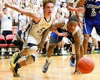 William D. Lewis The Vindicator  McDonald's Zack Fedyski(5) KaylinHeard(5) of Lutheraneast during McDonald's loss to Lutheran East in Canton 3-8-16.
