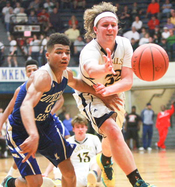William D. Lewis The Vindicator  McDonald'sMatt howard(32) and AlexanderHeath(0) of Lutheran East go for the ball during McDonald's loss to Lutheran East in Canton 3-8-16.