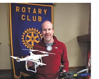 SPECIAL TO THE VINDICATOR | Dave Wilkeson of the Canfield Rotary recently displayed a pair of his drones following his presentation at a Rotary luncheon. Wilkeson discussed the design and development of drones and explained the capabilities of the drones he has designed and built, noting that they could some day be used for ventures like real estate marketing, structure inspections and land surveys. He also displayed a video recorded from one of his drones that featured familiar sights in the Mahoning Valley.
