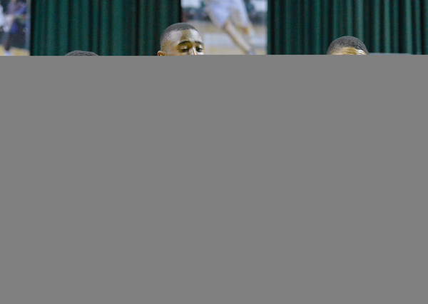 Jeff Lange | The Vindicator  WED, MAR 9, 2016 - Wrren Harding's Gabe Simpson (left) knocks the ball out of the hands of Garfield Height's Marreon Jackson (center) as Daejohn Bey looks on from the right during first quarter action of their Division I regional semifinal held at the Wolstein Center on the campus of Cleveland State University on Wednesday. Garfield Heights defeated Harding 49-43.