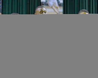 Jeff Lange | The Vindicator  WED, MAR 9, 2016 - Wrren Harding's Gabe Simpson (left) knocks the ball out of the hands of Garfield Height's Marreon Jackson (center) as Daejohn Bey looks on from the right during first quarter action of their Division I regional semifinal held at the Wolstein Center on the campus of Cleveland State University on Wednesday. Garfield Heights defeated Harding 49-43.