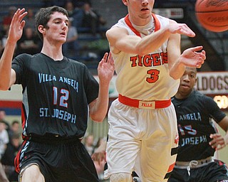 William d Lewis the Vindicator  N Falls Jaden Walton(3) passes around VASJ Daniel McGarry(12) during 3-8-16 action in Canton.