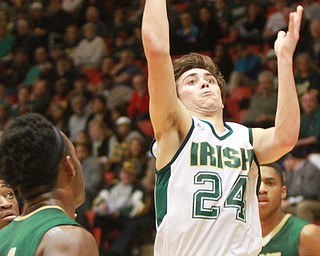 William D Lewis The Vindicator Ursuline's Greg Parella(24) shoots.