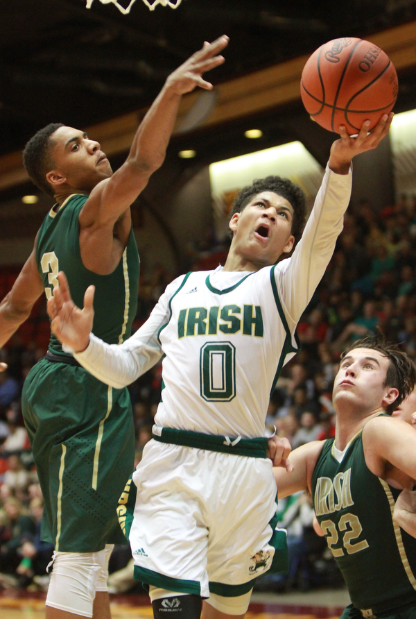 William d Lewis the Vindicator  Ursulines Mike Hughes goes for 2 past SVSM Jayvon Groves(3)