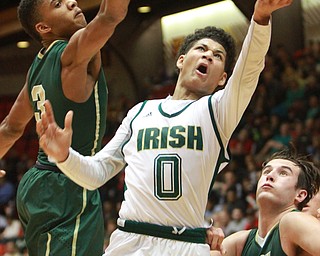 William d Lewis the Vindicator  Ursulines Mike Hughes goes for 2 past SVSM Jayvon Groves(3)