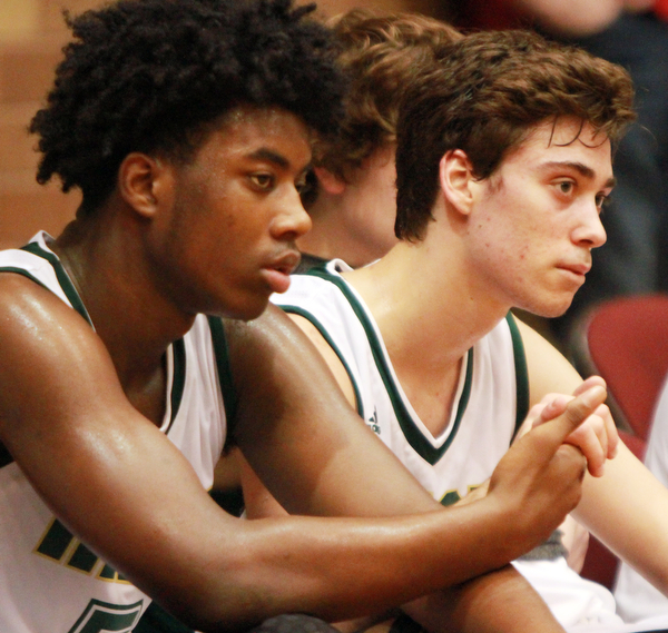 William D Lewis the Vindicator  Ursuline Anthony Howell, left, and Greg Parella watch the final seconds of loss to Akron SVSM in Canton 3-10-16.