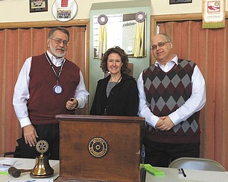 SPECIAL TO THE VINDICATOR |  Struthers Rotary hosted guest speaker Sandra Horvath, the literacy coordinator for Struthers Elementary School, on Feb. 23. Horvath discussed Right to Read Week, celebrated from Feb. 29 to March 4. The elementary school marked the event with a Guest Reading Day on March 3. Rotary president Drew Hirt, left, and host Rotarian Tom Baringer are shown with Horvath following her presentation to the group.