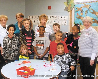 SPECIAL TO THE VINDICATOR | GFWC Ohio Warren Junior Women’s League Advocates for Children hosted a Valentine’s Day party at their adopted school, Jefferson Elementary in Warren. Party activities included bingo, crafts, dancing and Valentine’s Day treats. Club members gave students decorated treat bags. Students at the party included, sitting at the table from left, Justina R. and Jermaine B; standing are Ty Marion M., Makenzie M., Alijah L., and Jayon J.; in back row are Carol Batchelder, Peggy Boyd, Eddie Walcott, Michael M., Faith S. and Sue Smith.
