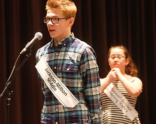      ROBERT K. YOSAY  | THE VINDICATOR..Jackson Milton Middle School Ryan Staton.. spells the 'championship' word a- Nina C Dill is in the backround..THE VINDICATOR 83rd Regional Spelling Bee  at YSU Kilcawley Room...--30-...