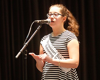      ROBERT K. YOSAY  | THE VINDICATOR..Montessori School Nina C Dill  uses the hand method to spell....THE VINDICATOR 83rd Regional Spelling Bee  at YSU Kilcawley Room...--30-...