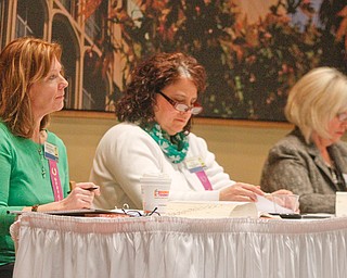      ROBERT K. YOSAY  | THE VINDICATOR..Checking dictionary spellings....THE VINDICATOR 83rd Regional Spelling Bee  at YSU Kilcawley Room...--30-...