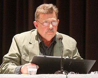      ROBERT K. YOSAY  | THE VINDICATOR..Dr Fred Owens..  Pronouncer of the Words-.as he reads a meaning to a word to be spelled..THE VINDICATOR 83rd Regional Spelling Bee  at YSU Kilcawley Room...--30-...