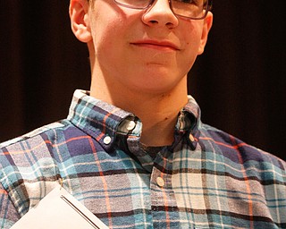      ROBERT K. YOSAY  | THE VINDICATOR.. the first place trophy to Ryan Staton from Jackson Miltmon Middle School and ..THE VINDICATOR 83rd Regional Spelling Bee  at YSU Kilcawley Room...--30-...