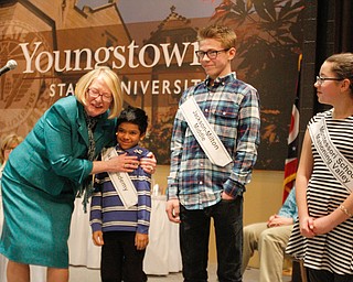      ROBERT K. YOSAY  | THE VINDICATOR..Nena Perkins.. congratulates third place winner AKiva Academy  Devesh Mohapatra - Ryan Staton from Jackson Miltmon Middle School and Nina c Dill form Montessori School..THE VINDICATOR 83rd Regional Spelling Bee  at YSU Kilcawley Room...--30-...