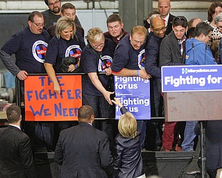      ROBERT K. YOSAY  | THE VINDICATOR..Former Secretary of State Hillary Clinton with Sherrod Brown and Congressman Tim Ryan  at M7 Technologies. ..--30-...     ROBERT K. YOSAY  | THE VINDICATOR..Former Secretary of State Hillary Clinton with Sherrod Brown and Congressman Tim Ryan  at M7 Technologies. ..--30-...