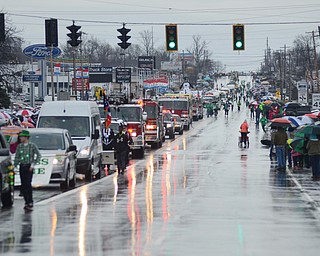 Katie Rickman | The Vindicator.Despite rain and cooler temperatures many gathered along Rt. 224 for Annual St. Patricks Day Parade in Boardman on Sunday afternoon.