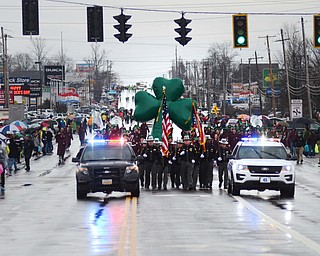 Katie Rickman | The Vindicator.A large shamrock float is carried down the parade route as the Annual St. Patricks Day Parade makes down the long road on Sunday afternoon.