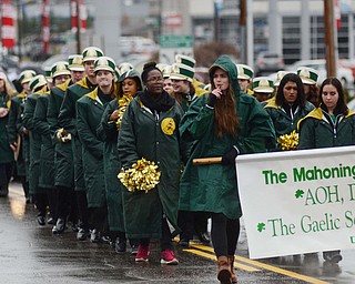 Katie Rickman | The Vindicator.Students from The Ursuline High School band walk down Rt. 224 during the St. Patricks Day Parade in Boardman on Sunday afternoon.