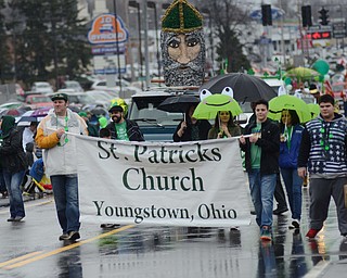 Katie Rickman | The Vindicator.A float of Saint Patrick is driven down Rt. 224 during the St. Patricks Day Parade as St. Patricks Church leads the way in Boardman on Sunday afternoon..