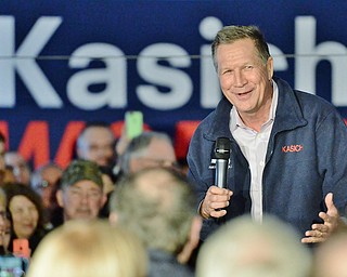 Jeff Lange | The Vindicator  SUN, MAR 13, 2016 - Ohio Governor John Kasich smiles as he speaks to his supporters during his presidential campaign rally held at Spread Eagle Tavern in Hanoverton Sunday afternoon.
