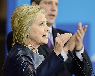 Jeff Lange | The Vindicator  SAT, MAR 12, 2016 - Democratic presidential candidate Hillary Clinton speaks as U.S. Rep. Tim Ryan applauds during her campaign rally in Youngstown Saturday night.